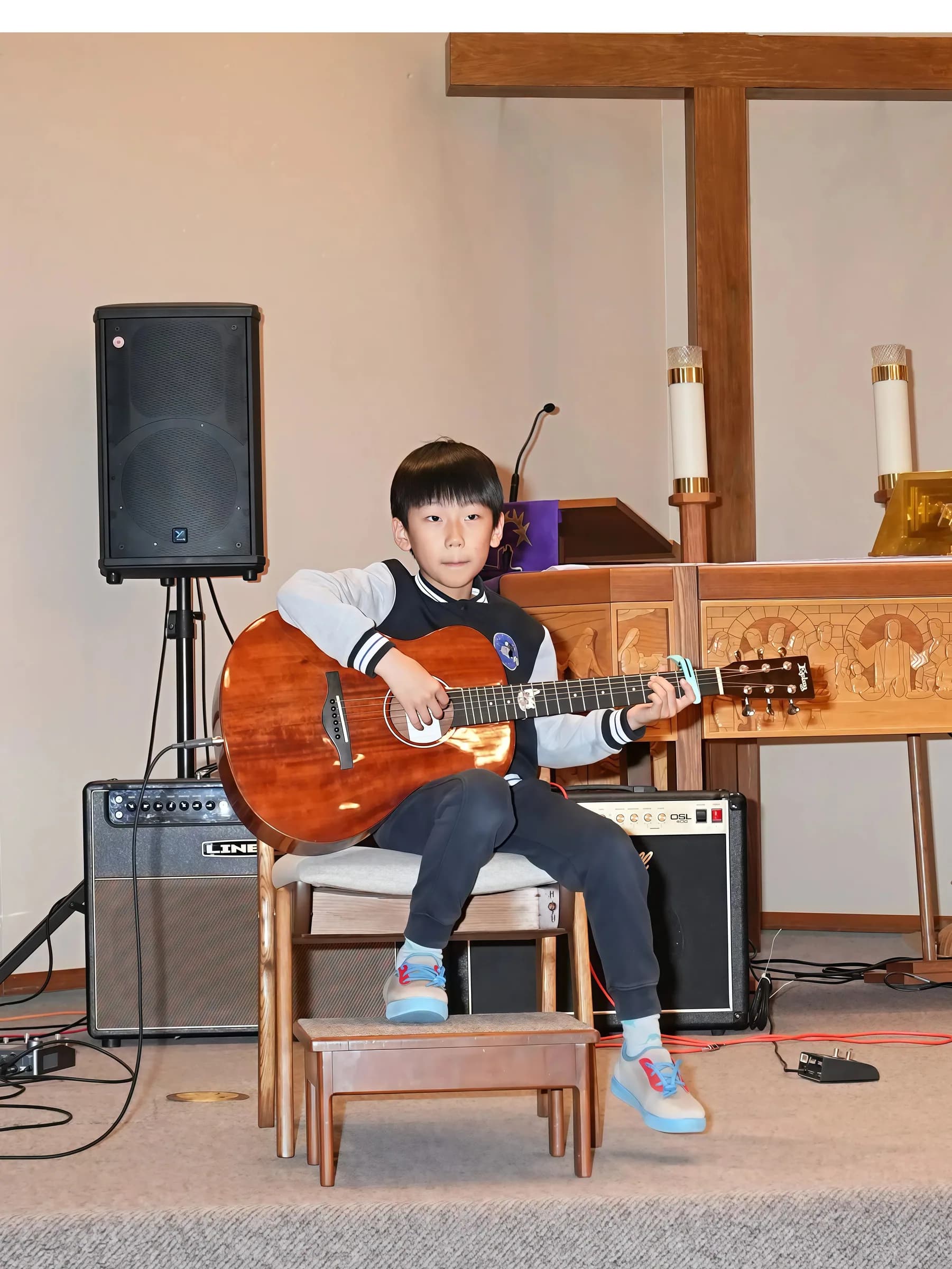 Student performance moment from Reindeer Education's 2026 public gallery.