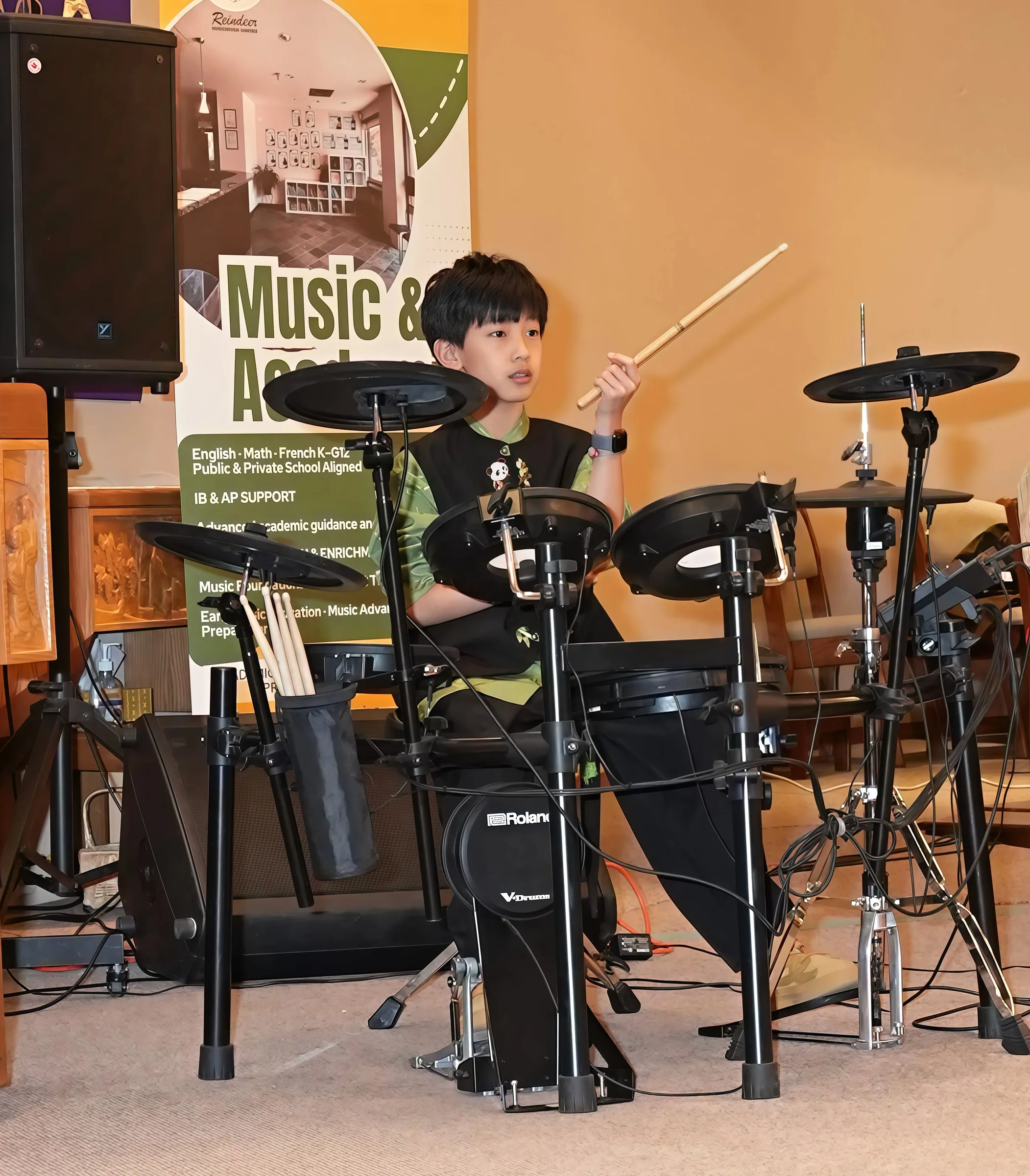 Student performance moment from Reindeer Education's 2026 public gallery.