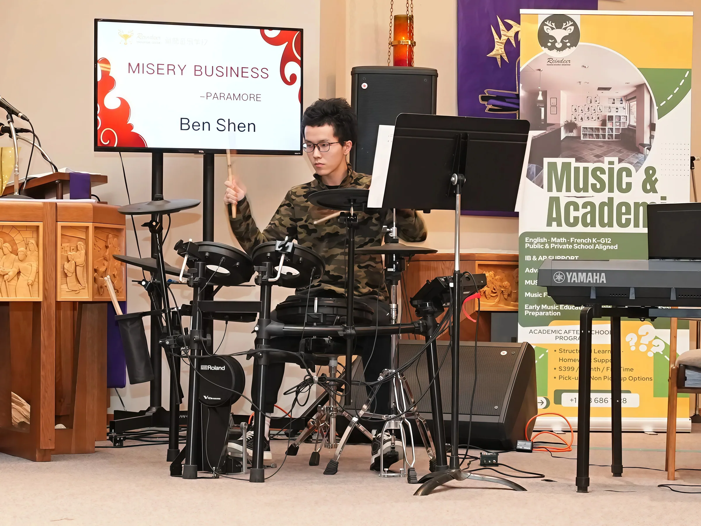 Student performance moment from Reindeer Education's 2026 public gallery.