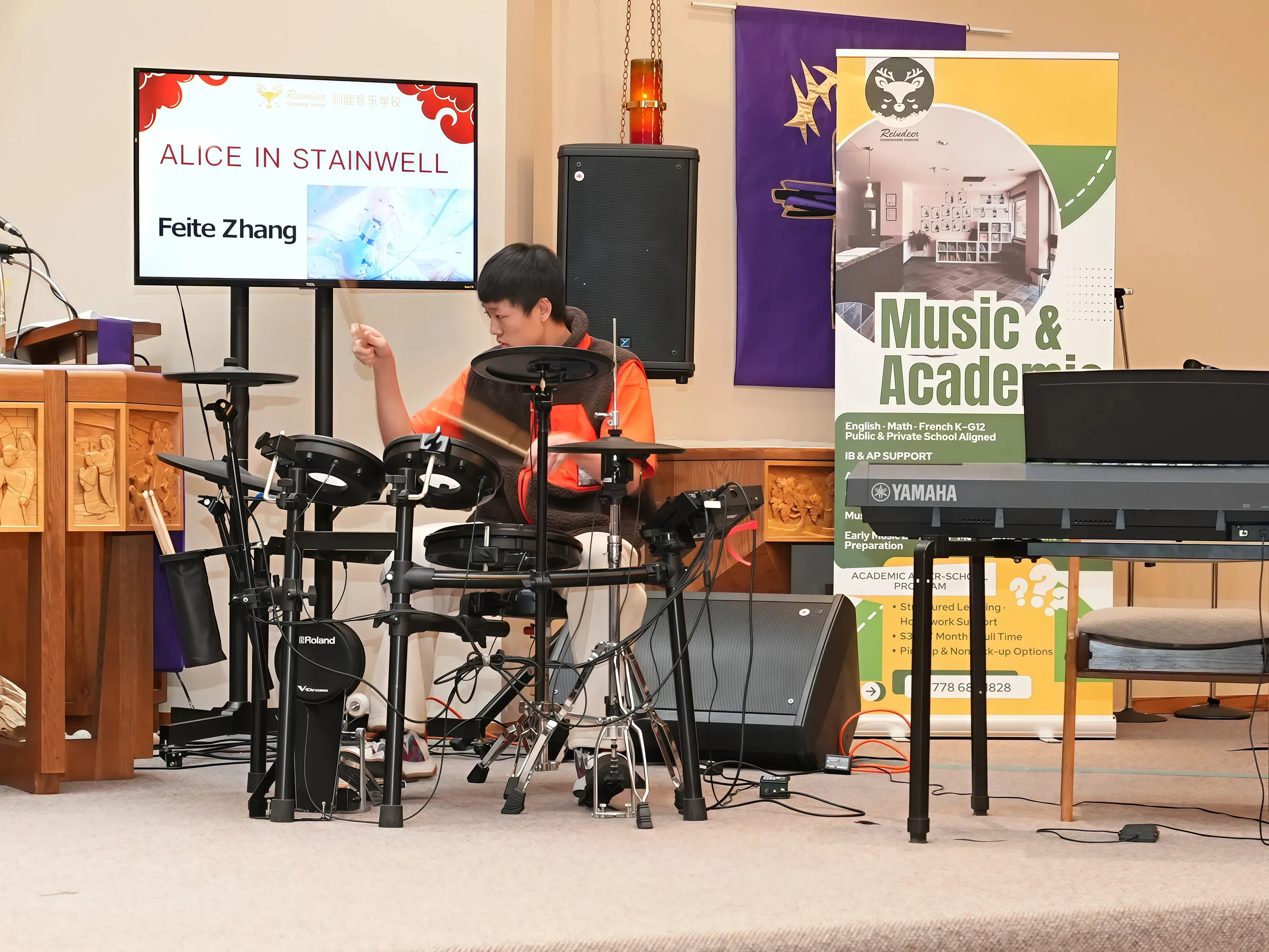 Student performance moment from Reindeer Education's 2026 public gallery.